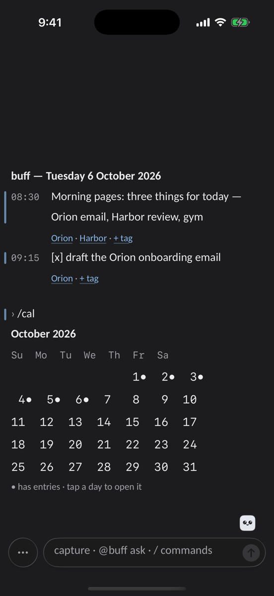 The month as a calendar, days with notes marked, in dark mode